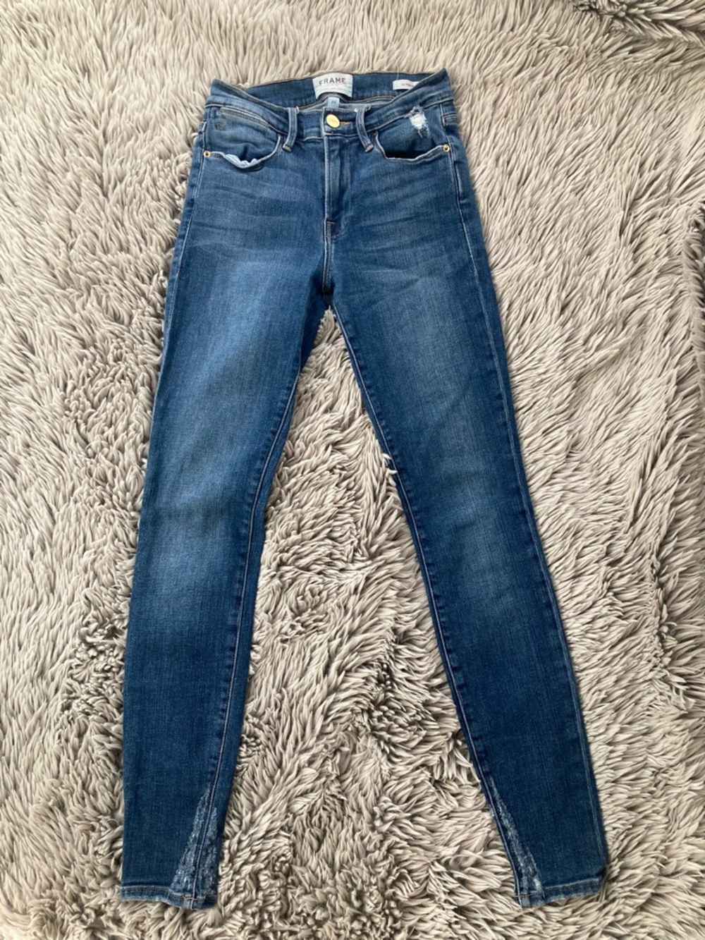 Frame Denim Skinny Jeans in  Blue Wash size 24 Distressed Hem Anthropology